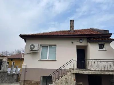 a house with a balcony on top of it at Еделвайс Edelvais in Kostenets Village