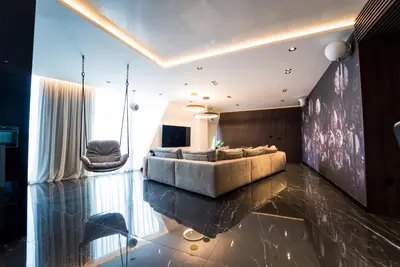 a living room with a couch and a table at Sofia Paradise View Apartment in Sofia