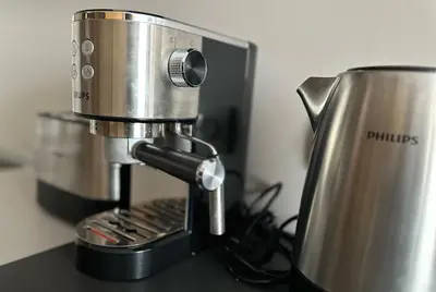 a coffee maker sitting on top of a counter at Contemporary Charm in Old Sofia in Sofia