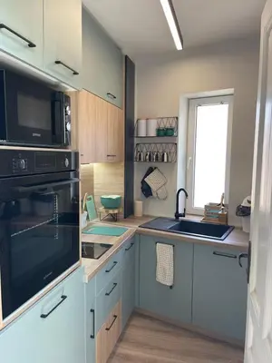 a kitchen with a sink and a stove top oven at Kapana Guest House on Central Pedestrian street with Parking included in Plovdiv