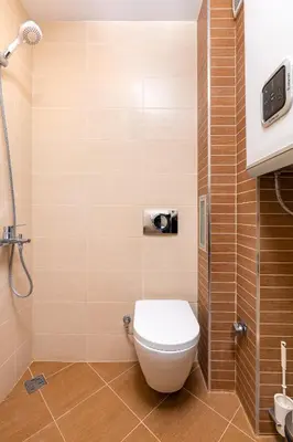 a bathroom with a toilet and a shower at South Plovdiv - 2BD Flat with Balcony by Flat Mаnager in Plovdiv