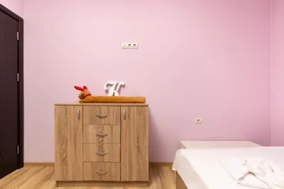 a bedroom with two beds and a dresser with a sink at South Plovdiv - 2BD Flat with Balcony by Flat Mаnager in Plovdiv