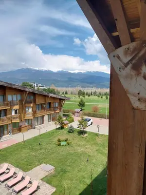 a view of the courtyard of a hotel at Piringolf apartment in Razlog