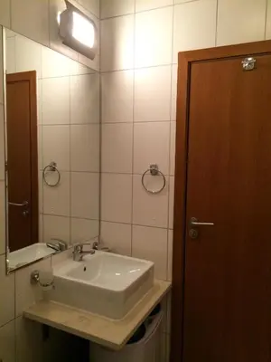 a bathroom with a sink and a mirror at Studio in Cedar Lodge 3 in Bansko