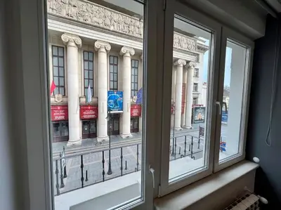 a view of a building from a window at LOCATION ! Sofia Opera View Apartment next to ALEXANDER NEVSKY CATHEDRAL in Sofia