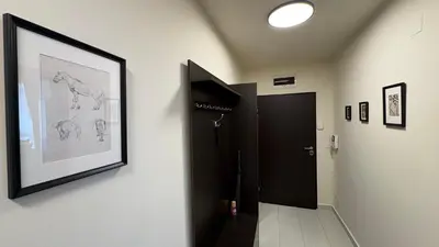 a hallway with a drawing of a horse on the wall at Two-bedroom Apartments - Tundza in Sofia