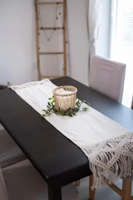 a black table with a basket on top of it at Cozy home next to Aliosha - Boho Stay in the heart of Plovdiv in Plovdiv