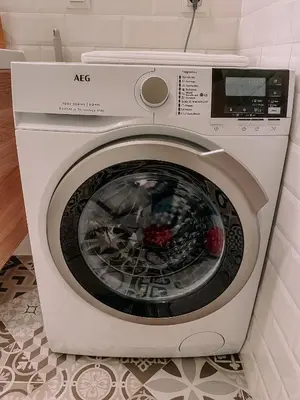 a washer and dryer in a bathroom at Vitosha View Apartment & Free Parking in Sofia