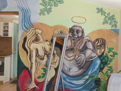 a mural of a man in front of a mirror at Artistic loft with AMAZING VIEW in Plovdiv