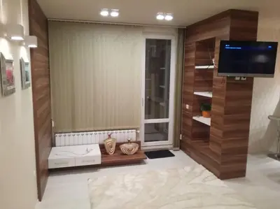 a living room with a large window and a flat screen tv at Top luxury apartment, great location in Sofia