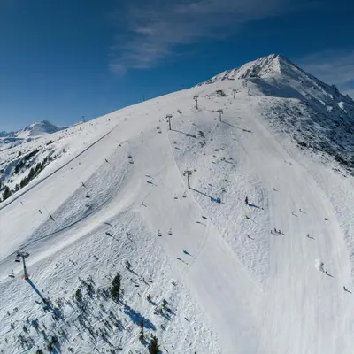 a snow covered mountain with a ski slope at The Nature View Suite, part of Terra Complex & Spa in Bansko