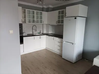 a kitchen with white cabinets and a white refrigerator at One Bedroom Apartment 61 - Restaurant Stadium Plovdiv in Plovdiv