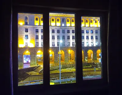 a view of a large building from a window at 