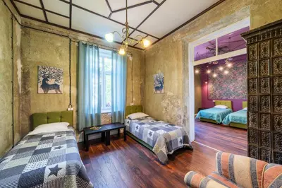 a bedroom with two beds and a window at The Green Bar House in Sofia