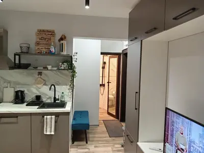 a kitchen with a sink and a counter top at Bijoux Apt in the heart of Sofia in Sofia