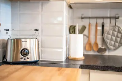 a toaster sitting on a counter in a kitchen at Best Mountain View Chalet in Bansko