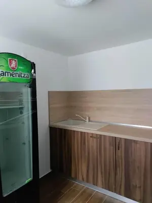 a kitchen with a sink and a counter top at Kъща за гости Демария in Koprivshtitsa