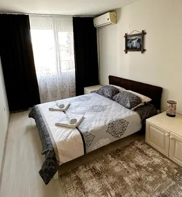 a bedroom with a bed and a window at Diana’s place in Sandanski