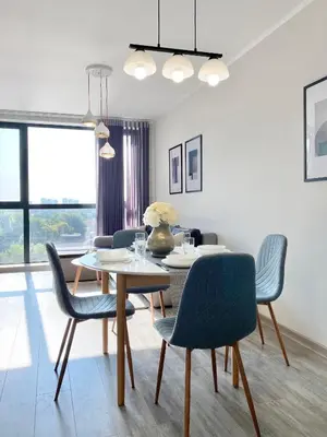 a dining room with a table and chairs at Private Apartment for 4 Guests and Parking in Plovdiv