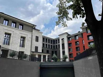 a row of buildings with a gate in front at 7Mins City Garden and Center+P in Plovdiv