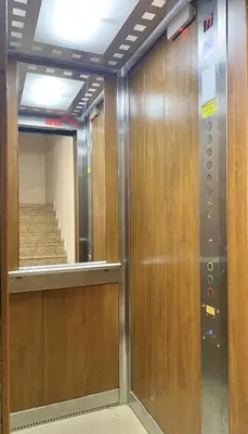 an elevator in a building with a mirror at Entire Apartment for 4 Guests in Sofia in Sofia