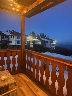 a view from the balcony of a house at Grand resort luxury apartment in Pamporovo