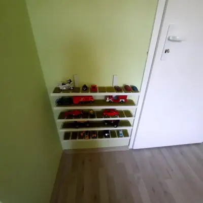 a room with a closet filled with lots of shoes at 