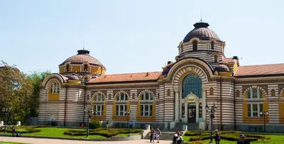 a large building with people walking in front of it at Free Parkingand Relax in Sofia