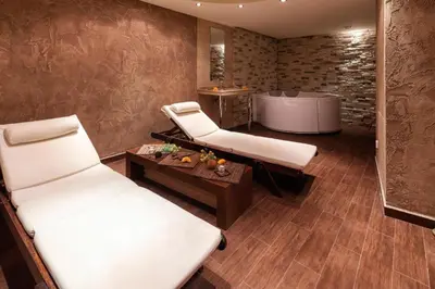 a room with two beds and a bath tub at Terra complex -D6 - Balkan private apartment-Spa Sking Golf and Relax in Razlog