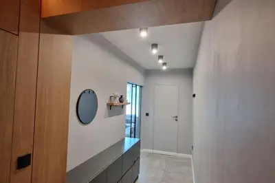a bathroom with a sink and a mirror on the wall at Mila's Cozy 1 Bedroom Apartment in Sofia