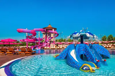 a water park with a water slide in the middle at The Wind Mills Hydropark in Gorna Malina