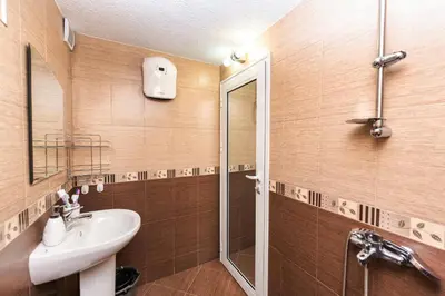 a bathroom with a sink and a shower at Sweet Home 1 in Sandanski