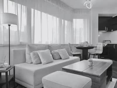a living room with a couch and a table at Sunny & Cozy Apartment for 4 Guests & Free Parking in Plovdiv