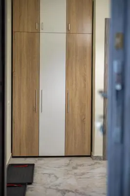 a pair of wooden cabinets in a room at Sunny Sofia Studio #1 in Sofia