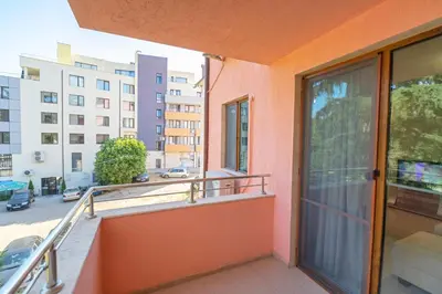 a balcony with a view of a street at Апартамент Амбра in Sandanski