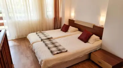 a bedroom with two beds in a room at 1BR Bright 300mbps WIFI Duplex - Two Floors in Bansko