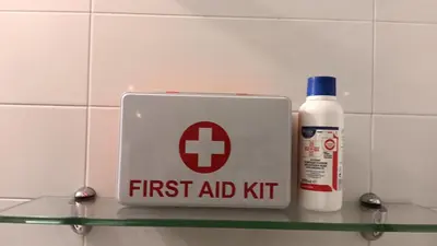 a first aid kit next to a bottle of first aid kit at Serenity Apt Iztok Sofia in Sofia