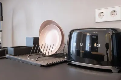 a toaster sitting on a counter next to a mirror at Top-Notch location, an Exceptionally Stylish flat in Sofia