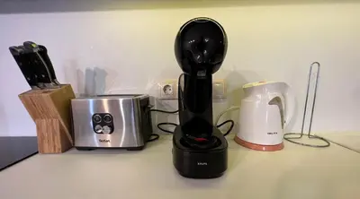 a black blender sitting on a counter next to a toaster at Johannesburg 2BDR Spacious Family apt w Parking and Playground in Sofia