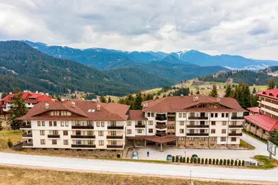 an aerial view of a resort in the mountains at Panorama Studio in Stoykite