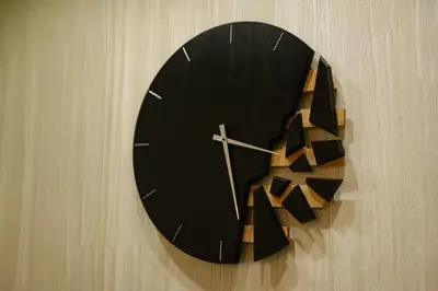 a black clock is hanging on a wall at 5 Seconds Away from the Main Street, FREE Secured Parking in Sofia