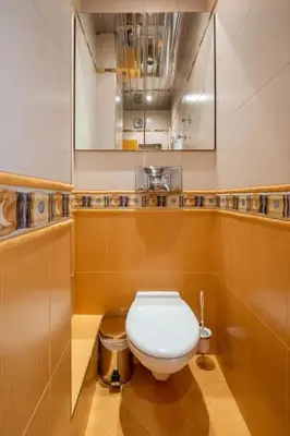 a bathroom with a white toilet in a room at Aristocratic Place, TOP location in Sofia