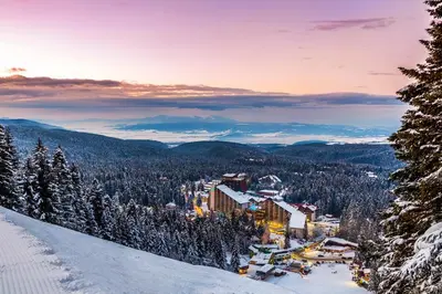 a view of a ski resort in the snow at Studio Royal Plaza sleeps 4 Prime location, distance to ski lift - 50M in Borovets