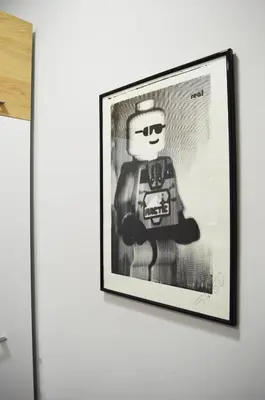 a framed picture of a lego man on a wall at Sofia's Best Kept Secret in Prime Location! in Sofia
