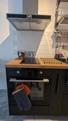 a kitchen with a stove with a counter top at 65 Duck House in Sofia
