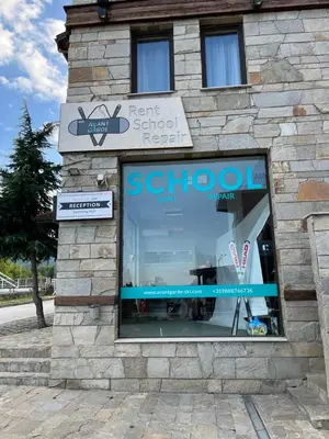 a store window with a sign on the front of it at Bansko Royal Towers - Studio 856 in Bansko
