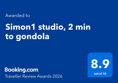a screenshot of a cell phone with the text upgraded to simon studio at Simon1 studio, 2 min to gondola in Bansko