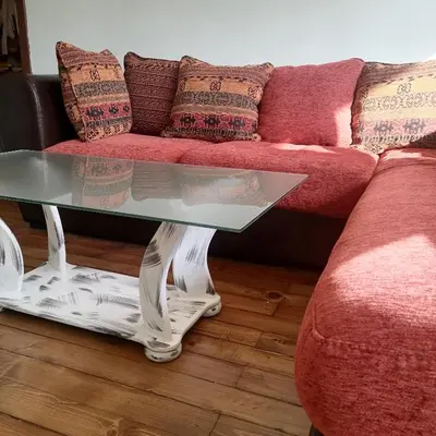 a living room with a couch and a table at M Art Apart in Sofia