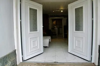 an open door to a room with a hallway at Musala 1 Bed & Breakfast in Kyustendil