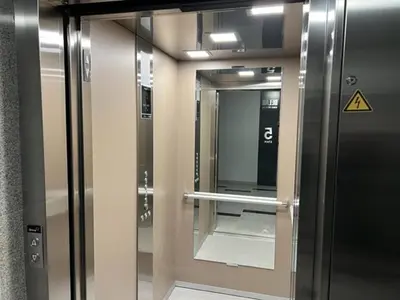 an elevator in a building with its door open at Апартамент Комфорт, близо до Летището in Sofia